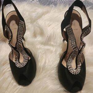 Selling black Fendi heels.